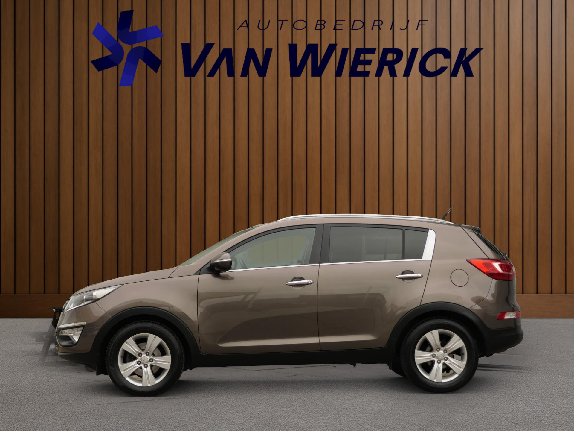 Kia Sportage 1.6 GDI X-ecutive Plus Pack 135PK | Cruise | Half leer/stof | Camera | Bluetooth | 48352153-1.jpg | Autobedrijf van Wierick