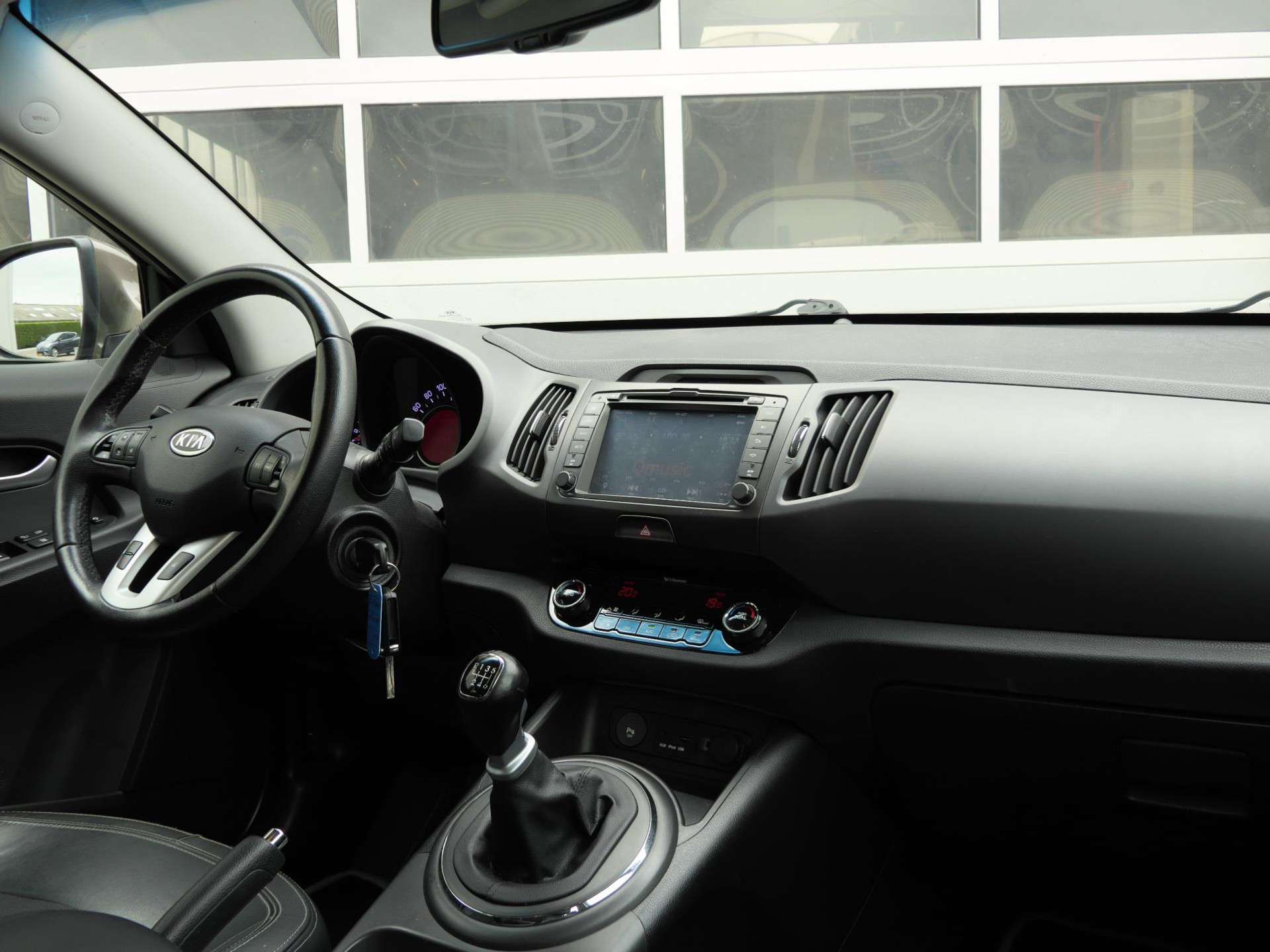 Kia Sportage 1.6 GDI X-ecutive Plus Pack 135PK | Cruise | Half leer/stof | Camera | Bluetooth | 48352153-10.jpg | Autobedrijf van Wierick