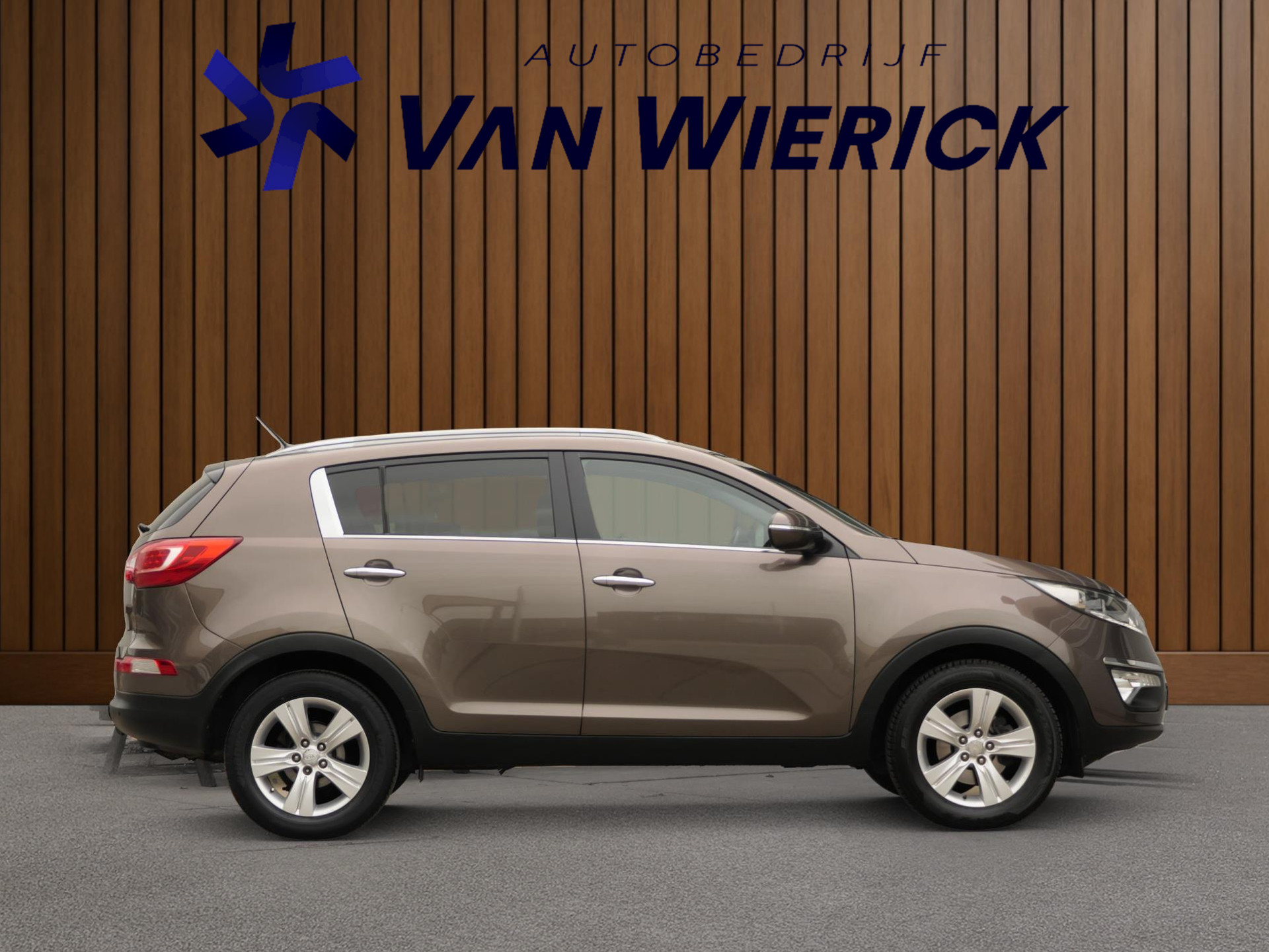 Kia Sportage 1.6 GDI X-ecutive Plus Pack 135PK | Cruise | Half leer/stof | Camera | Bluetooth | 48352153-2.jpg | Autobedrijf van Wierick
