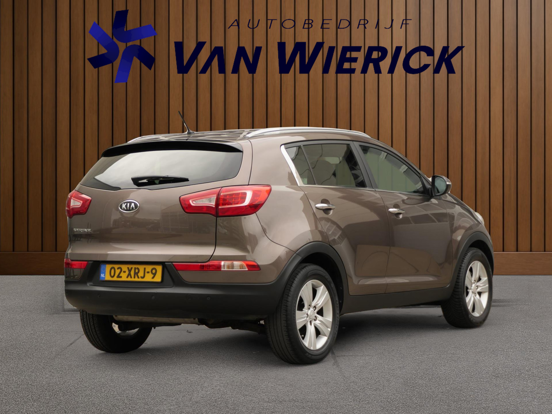 Kia Sportage 1.6 GDI X-ecutive Plus Pack 135PK | Cruise | Half leer/stof | Camera | Bluetooth | 48352153-3.jpg | Autobedrijf van Wierick