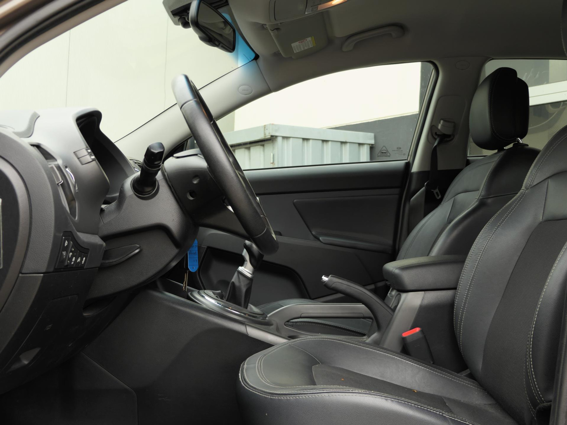 Kia Sportage 1.6 GDI X-ecutive Plus Pack 135PK | Cruise | Half leer/stof | Camera | Bluetooth | 48352153-7.jpg | Autobedrijf van Wierick
