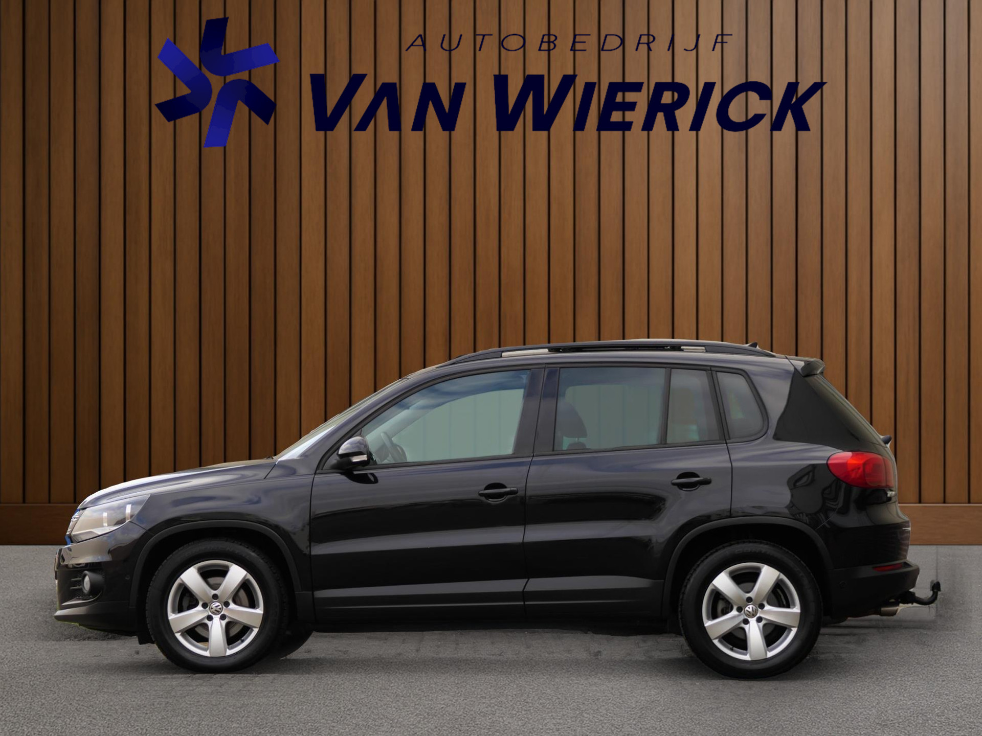 Volkswagen Tiguan 1.4 TSI Comfort&Design Edition | Trekhaak | Kantel/schuif Dak | Cruise 48477593-1.jpg | Autobedrijf van Wierick